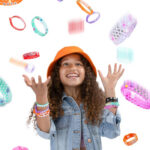 girl throwing bracelets in the air