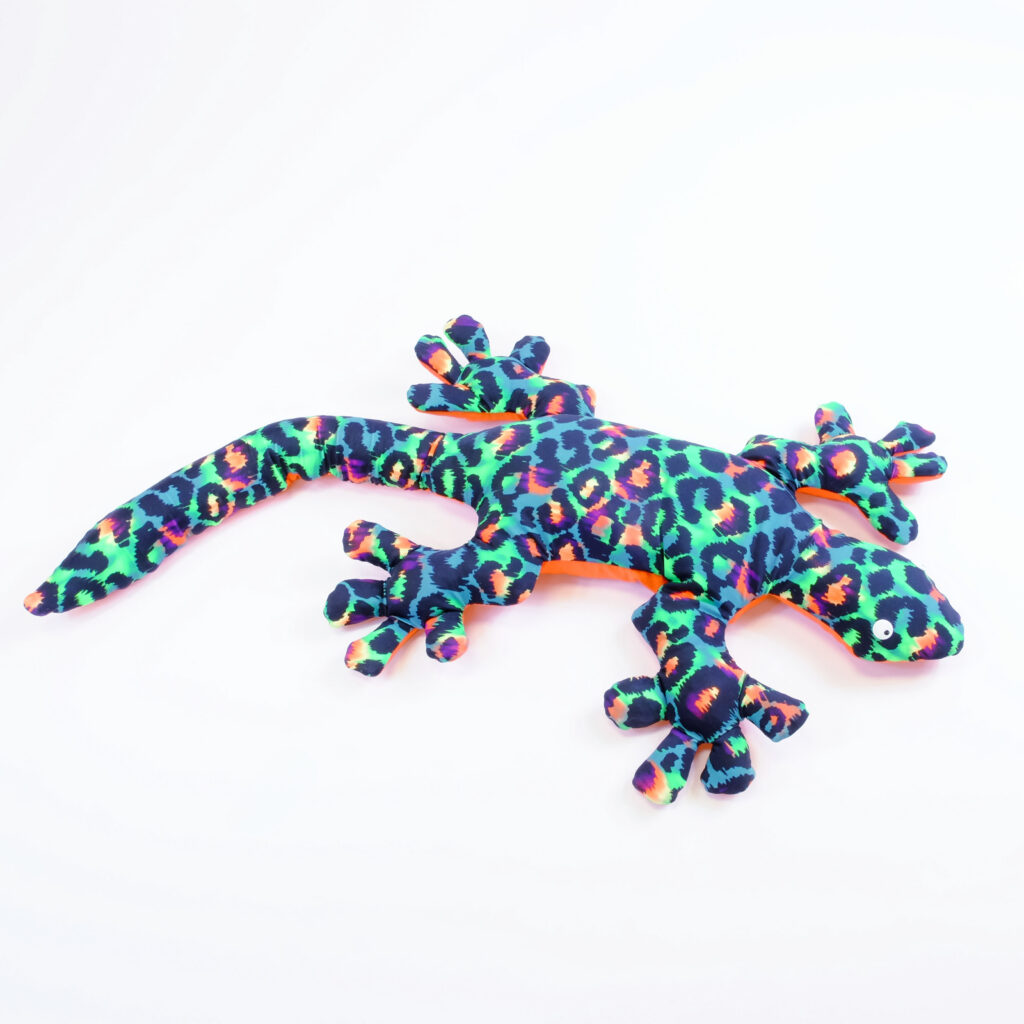 The Leopard Iggy Iguana has a bold neon multi-color leopard print top and a bright orange underside.